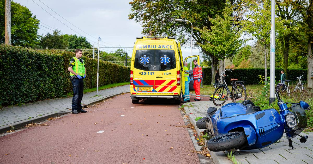 Scooterrijdster gewond na botsing met fietser in Tilburg, traumahelikopter geland.