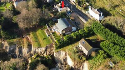 House on cliff on British island to be auctioned: guide price is just 12 euros