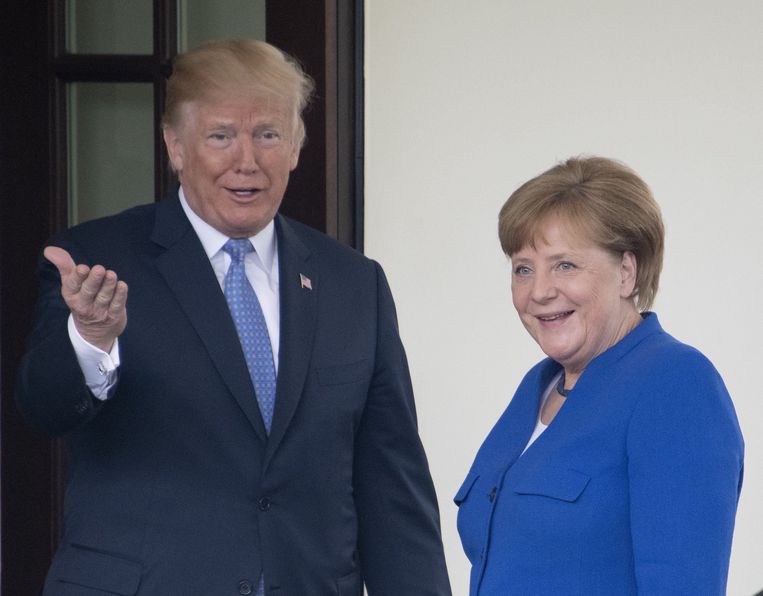 President Donald Trump ontving vorige week de Duitse bondskanselier Angela Merkel. Beeld Photo News