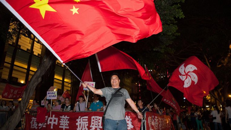 Pro-Chinese betogers op de straten van Hongkong. Beeld Ruben Lundgren