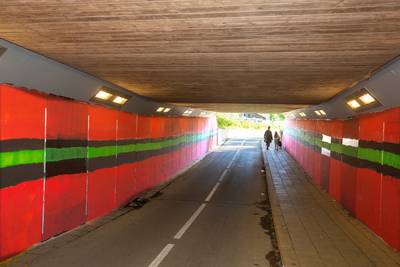 Tunneltje in Beek beklad met Vitessse-kleuren; dat laten NEC-supporters niet op zich zitten