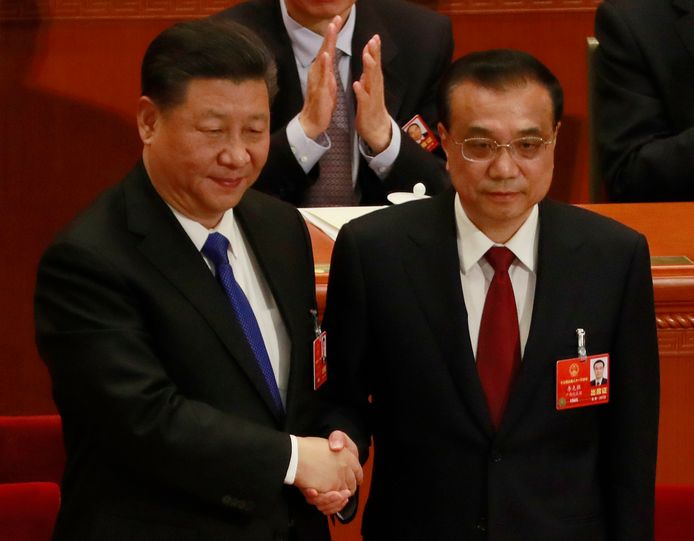 De Chinese President Xi Jinping (links) en premier Li Keqiang (rechts).