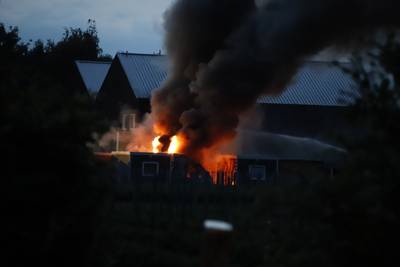 Brand in woonunits in Gassel, één persoon met brandwonden naar het ziekenhuis