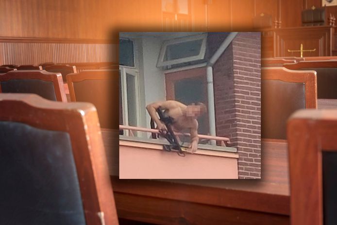 Kenzo K. tijdens de fatale dag, op zijn balkon met een kruisboog.
