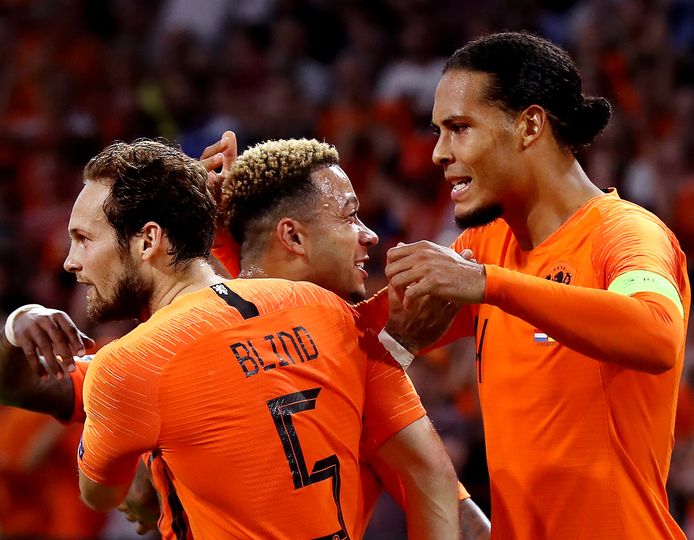 Daley Blind (links), Memphis Depay (midden) en Virgil van Dijk (rechts)