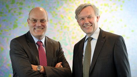 Peter Hartman, president-directeur van KLM (L) en Jos Nijhuis, CEO en bestuursvoorzitter van Schiphol Group (R). Foto ANP