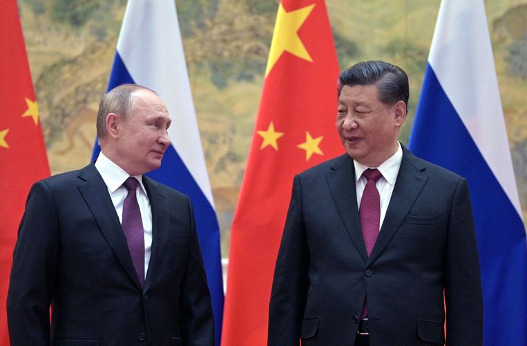 Russisch staatshoofd Vladimir Poetin en zijn Chinese evenknie Xi Jinping. Beeld AFP