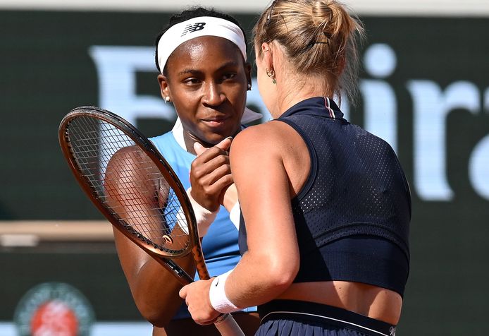 Coco Gauff receives congratulations from Anna Karolina Schmiedlova.