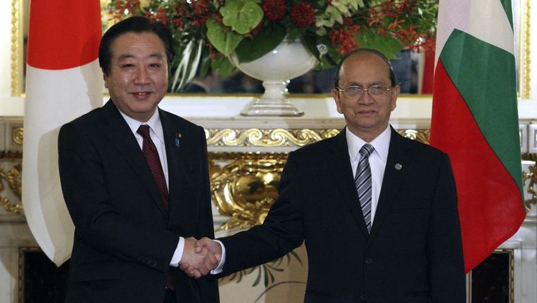 De Japanse premier Yoshihiko Noda (L) en de Myanmarese president Thein Sein. Beeld reuters