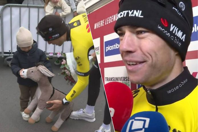 Zoontje Georges krijgt het ezeltje van Wout van Aert. / Wout van Aert.