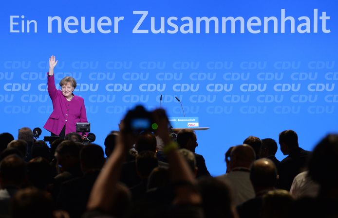 Angela Merkel verdedigde de nieuwe regering onder haar leiding met vuur.