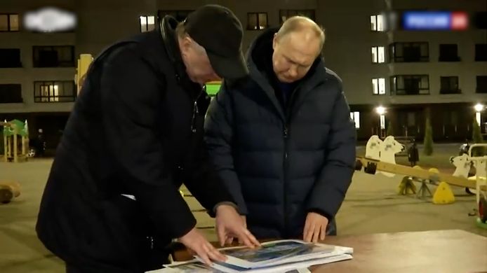 President Vladimir Putin on footage from Russian state media during a surprise visit to Mariupol