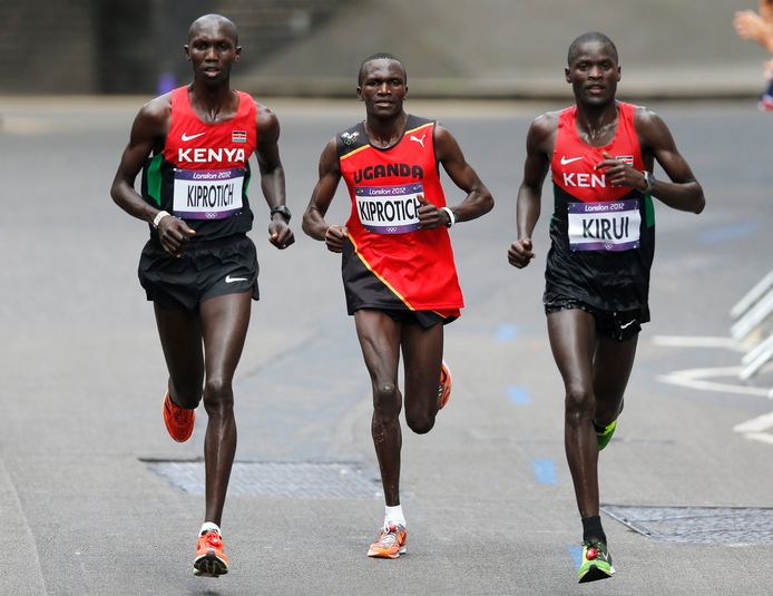 Abel Kirui (right), Stephen Kiprotich (centre) and Wilson Kipang (left) during the London Olympic Marathon. Photo: © epa