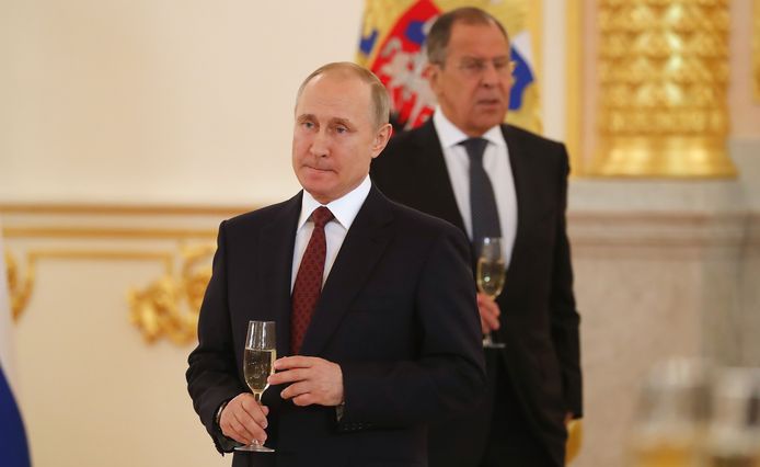 De Russische president Vladimir Poetin en de Russische Buitenlandminister Sergej Lavrov.