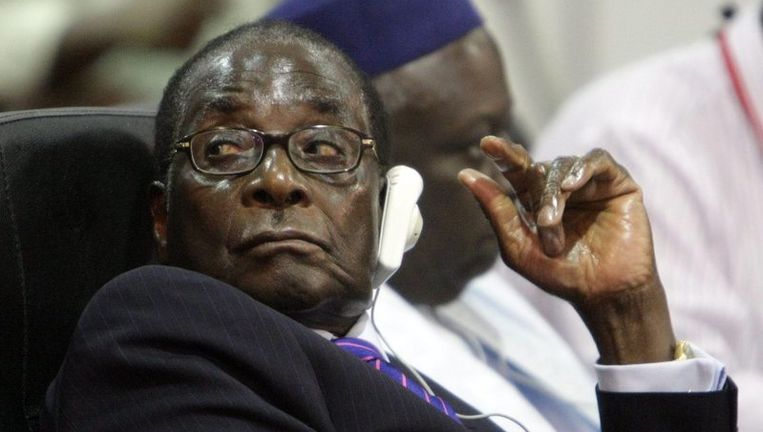 Volgens Mugabes partij Zanu-PF mag geen enkele buitenlander agrarische grond in Zimbabwe bezitten. Foto EPA Beeld 