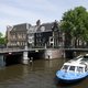 Toeristen in Amsterdam prijzen sfeer en de mensen