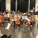 Rapper en Maestrowinnaar Sor dirigeert klassen op een Amsterdamse school – hoe een onstuimige leerling een vrolijke dirigent werd