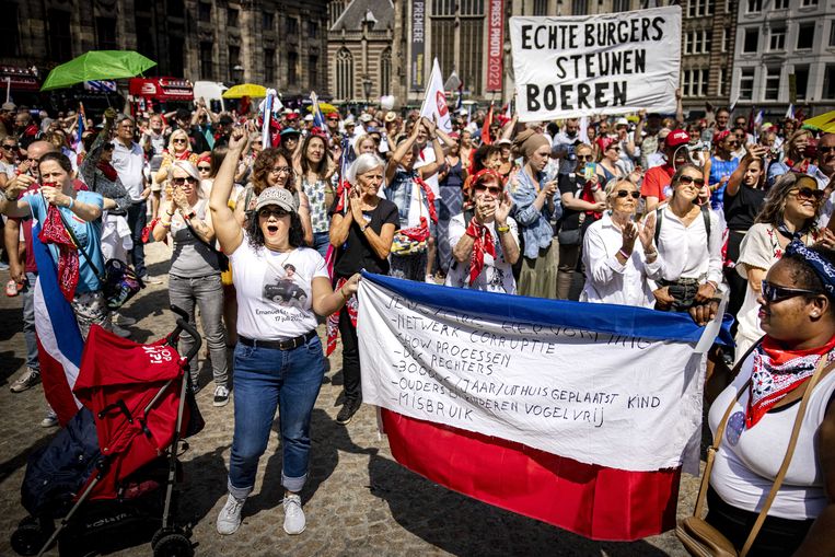 Sympathizers of the action group Nederland in Verzet demonstrate on Dam Square in Amsterdam to support farmers, fishermen and truckers.  Image ANP
