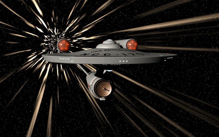 Dankzij de warpdrive racet het ruimteschip Enterprise in Star Trek door het onvoorstelbaar grote heelal.   Beeld 