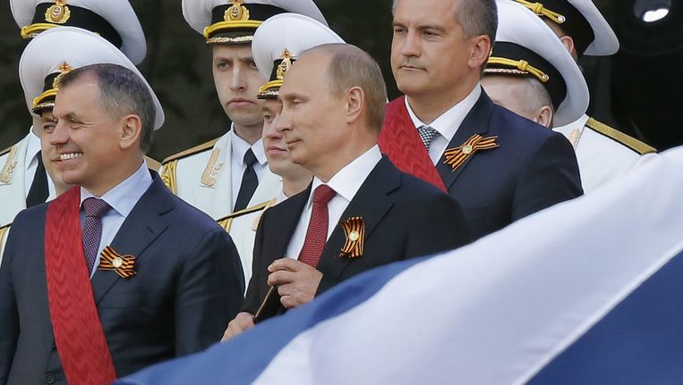De Russische president Vladimir Poetin viert vrijdag 'Victory Day' op de Krim. Beeld reuters