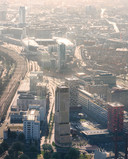 De  nieuwe woontoren Niko aan de Philitelaan/Beukenlaan op Strijp-S in Eindhoven - hier gemonteerd in een luchtfoto - markeert het begin, of het einde, van het hippe stadsdistrict.