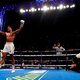Joshua komt met schrik vrij en behoudt bokstitels ondanks gebroken neus