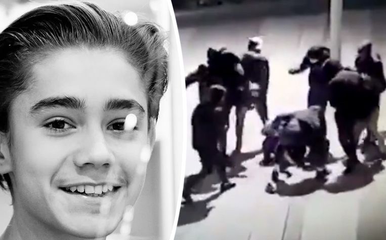De groep jongeren staat rondom de op de grond liggende Yuriy (15). Beeld RV
