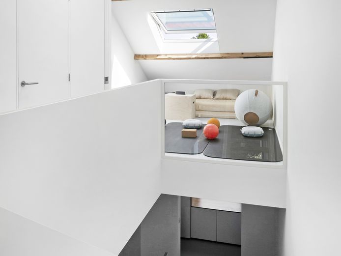 Op een mezzanine of brede overloop kan je een ontspanningsruimte voorzien.