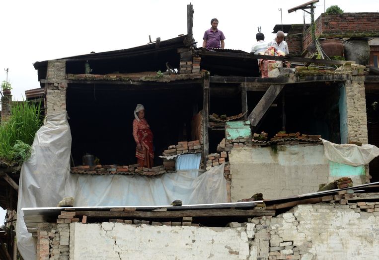Verschillende huizen in Bhaktapur, een voorstad van Kathmandu, zijn nog niet herbouwd. Beeld afp