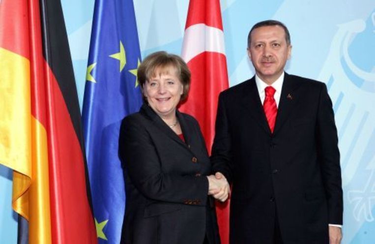 Angela Merkel en haar Turkse collega Recep Tayyip Erdogan na een persconferentie. ANP Beeld 