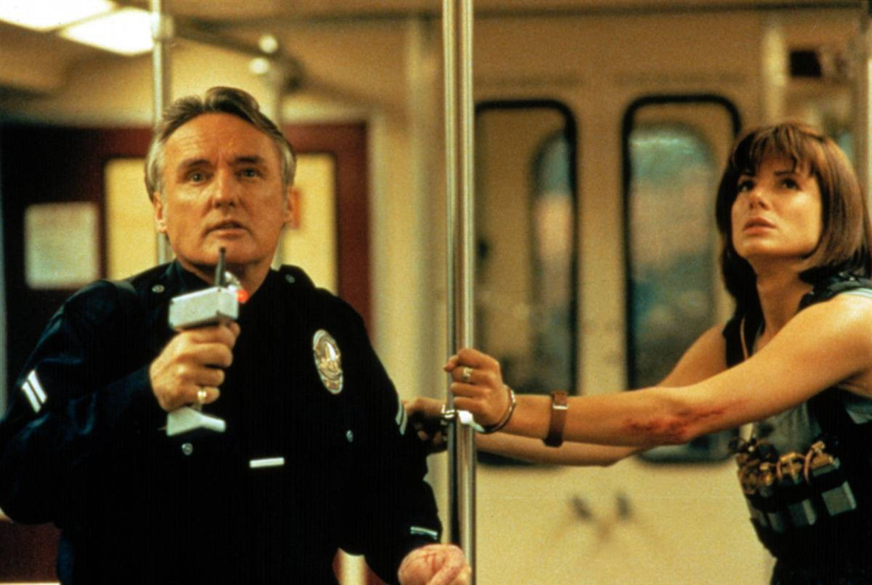 Dennis Hopper en Sandra Bullock in Speed van Jan de Bont. Beeld 
