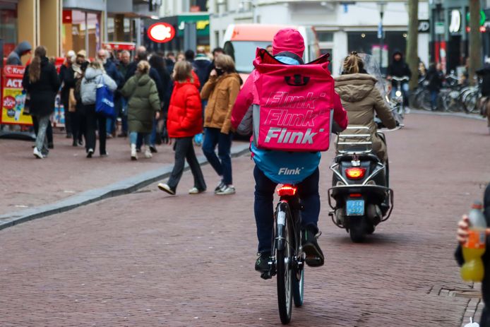 Een fietsbezorger van Flink.