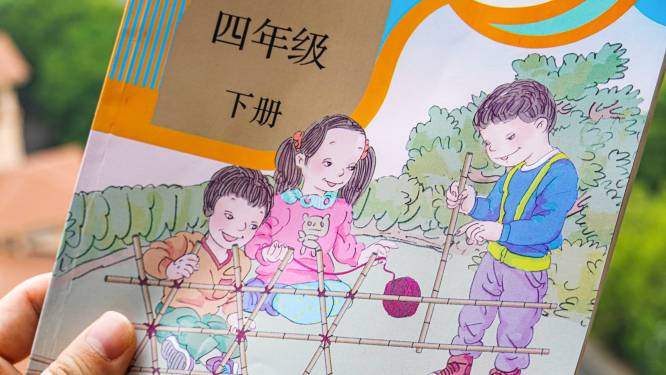 27 Chinese ambtenaren bestraft voor tekeningen van ‘lelijke kinderen met spleetogen’ in schoolboeken 