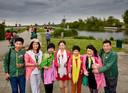 Chinezen bij de molens van Kinderdijk. Ze maken deel uit van een groep van 4500 chinese toeristen die op dit moment in Nederland zijn