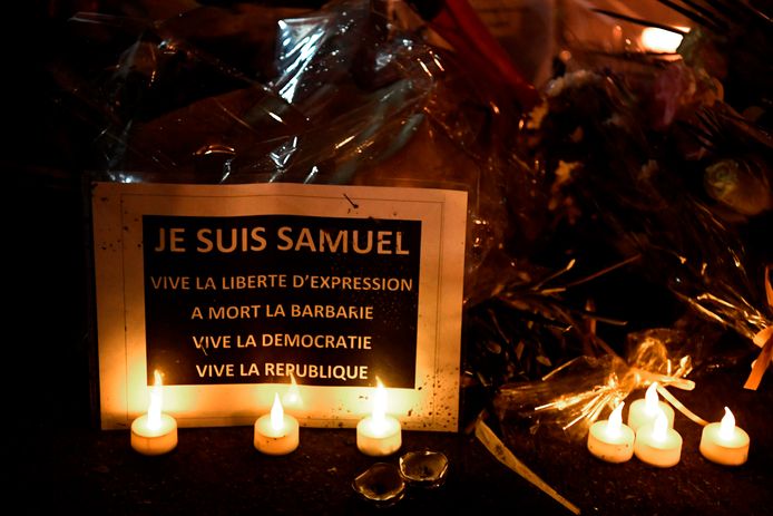 Flowers and candles at the school in Conflans-Sainte-Honorine