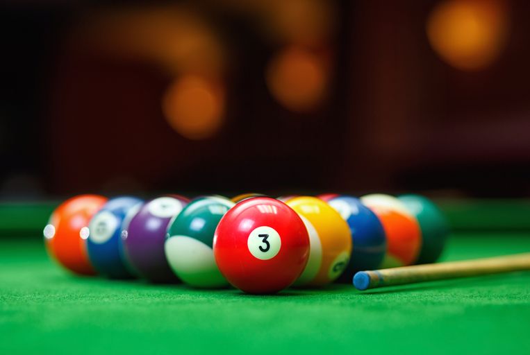Billiard balls in a green pool table, game Beeld Thinkstock