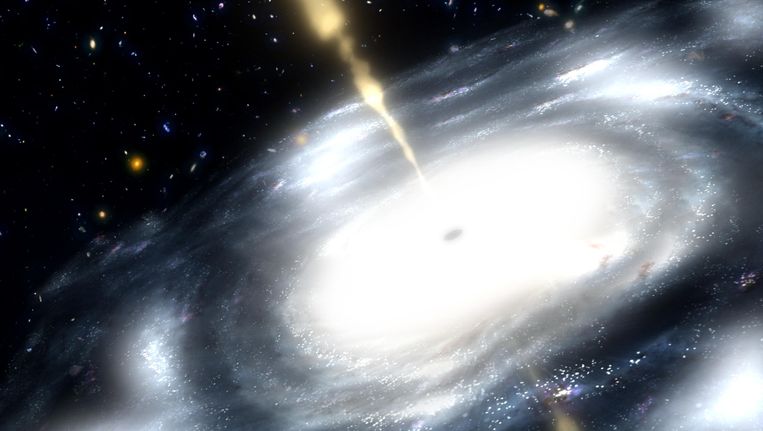 Een sterrenstelsel met een van de mysterieuze zwarte gaten in het midden. Beeld AFP