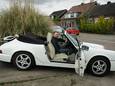 Johnny Pluut in de Porsche, toen-ie nog op zijn werk stond