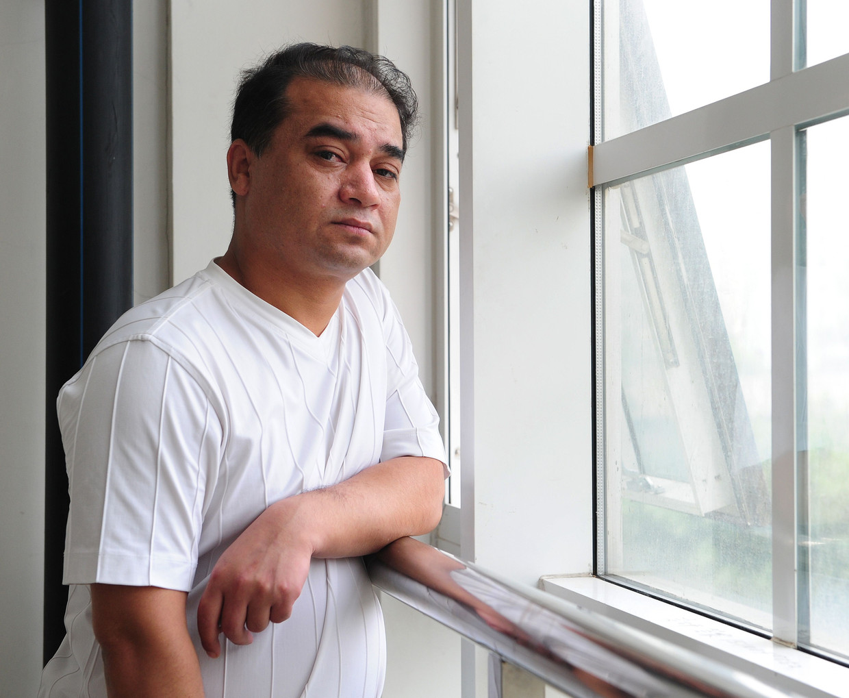 Ilham Tohti in Beijing.  Beeld AFP