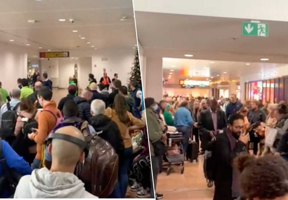 Beelden uit het filmpje tonen hoe tal van passagiers hun weg niet kunnen voortzetten in de luchthaven.