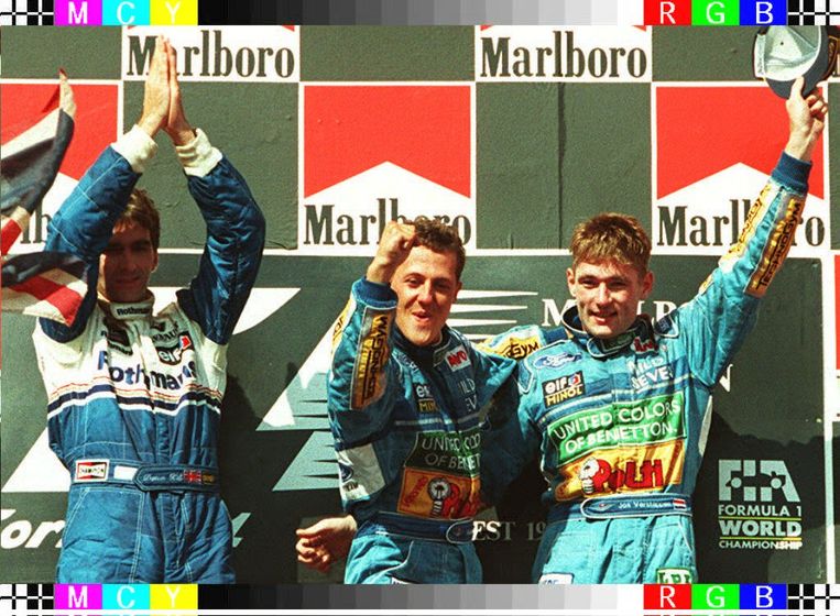 Damon Hill, Michael Schumacher en Jos Verstappen na de Grote Prijs van Hongarije in 1994. Beeld BELGA