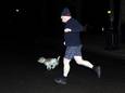 Boris Johnson tijdens het joggen met zijn hond Dilyn.