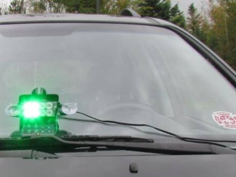 Als je in België een auto met groen zwaailicht ziet, kun je maar beter aan de kant gaan