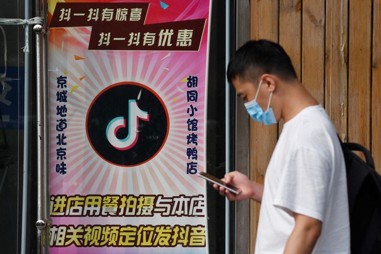 Het Chinese TikTok is zeker onder een jongeren een razend populaire app.  Beeld ANP/AFP