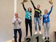 Nelleke Baldé (tweede van links) staat lachend op het podium in Sluis. Ze wist toen nog niet dat er geen prijzengeld was gereserveerd voor de vrouwencategorie. Links Angelo Grahame.