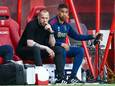 John Heitinga met zijn assistent Michael Reiziger, die coach van Jong Oranje wordt.