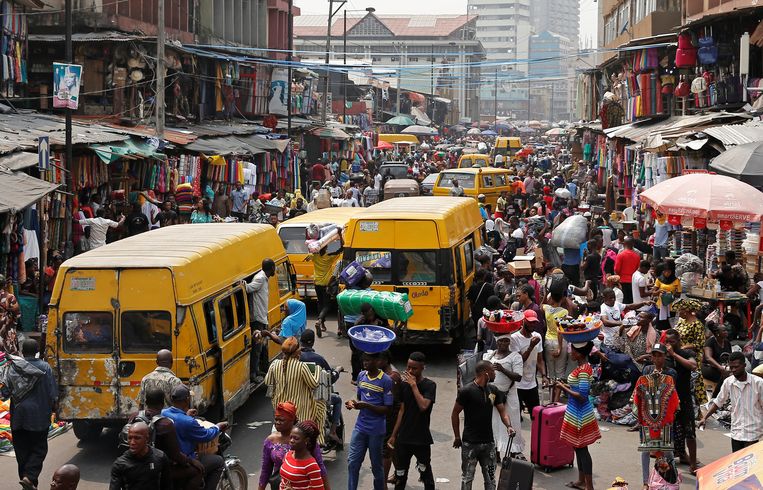 Drukte in Lagos, de hoofdstad van Nigeria. Beeld REUTERS
