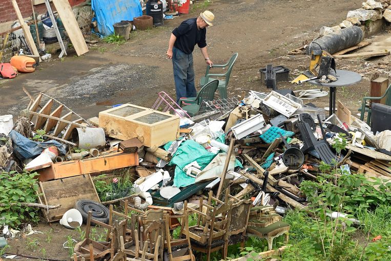 Schade na het noodweer in Wallonië. Beeld Photo News