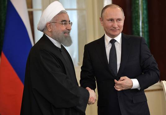 Poetin met de Iraanse president Hassan Rouhani.