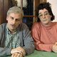 Heel ‘In de gloria’ speelt zich op de dunne irritatiegrens tussen werkelijkheid, of nog erger: de werkelijkheid volgens de televisie, en humor